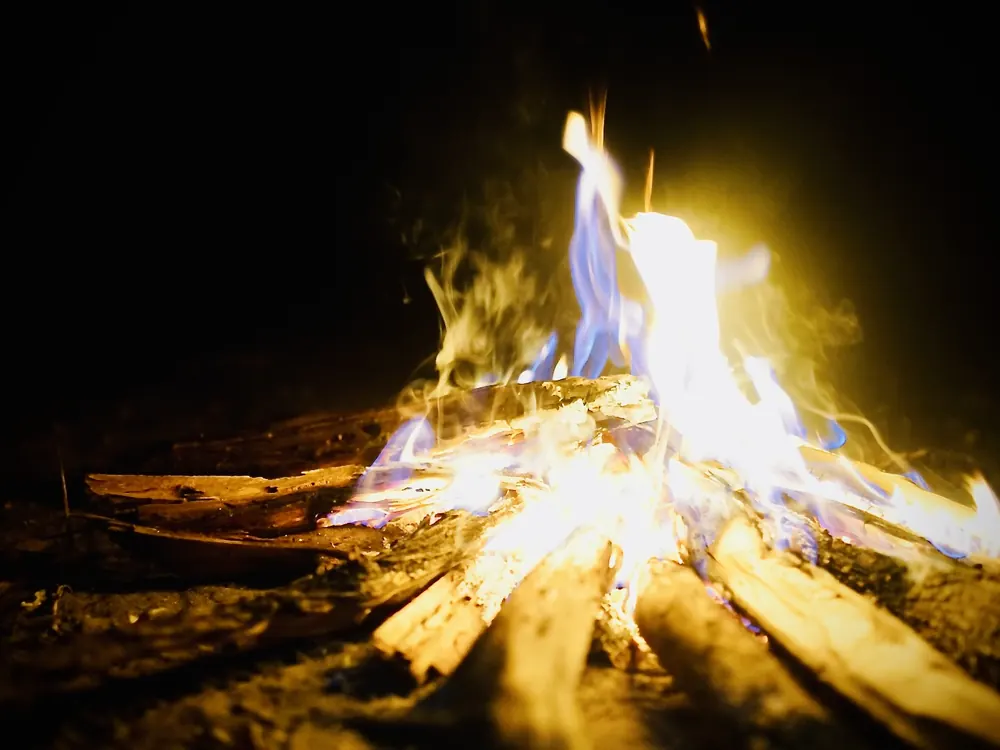 Fire burning at night.