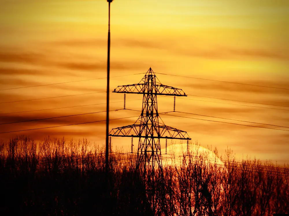 Power transmission tower at sunset.